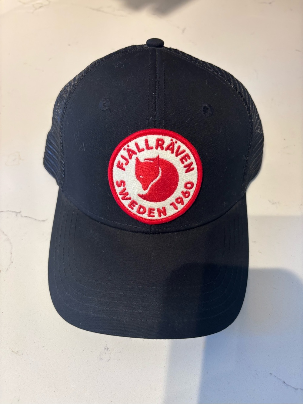 Fjallraven Black Unisex Trucker Hat with Red Logo Patch